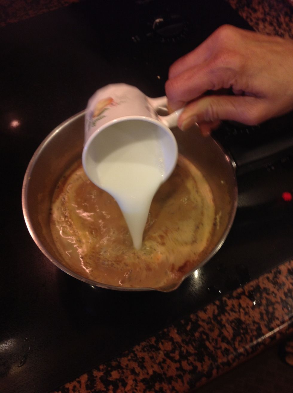 Add 1st cup of milk after its heated (water should be boiling) and while the 2nd cup is being microwaved