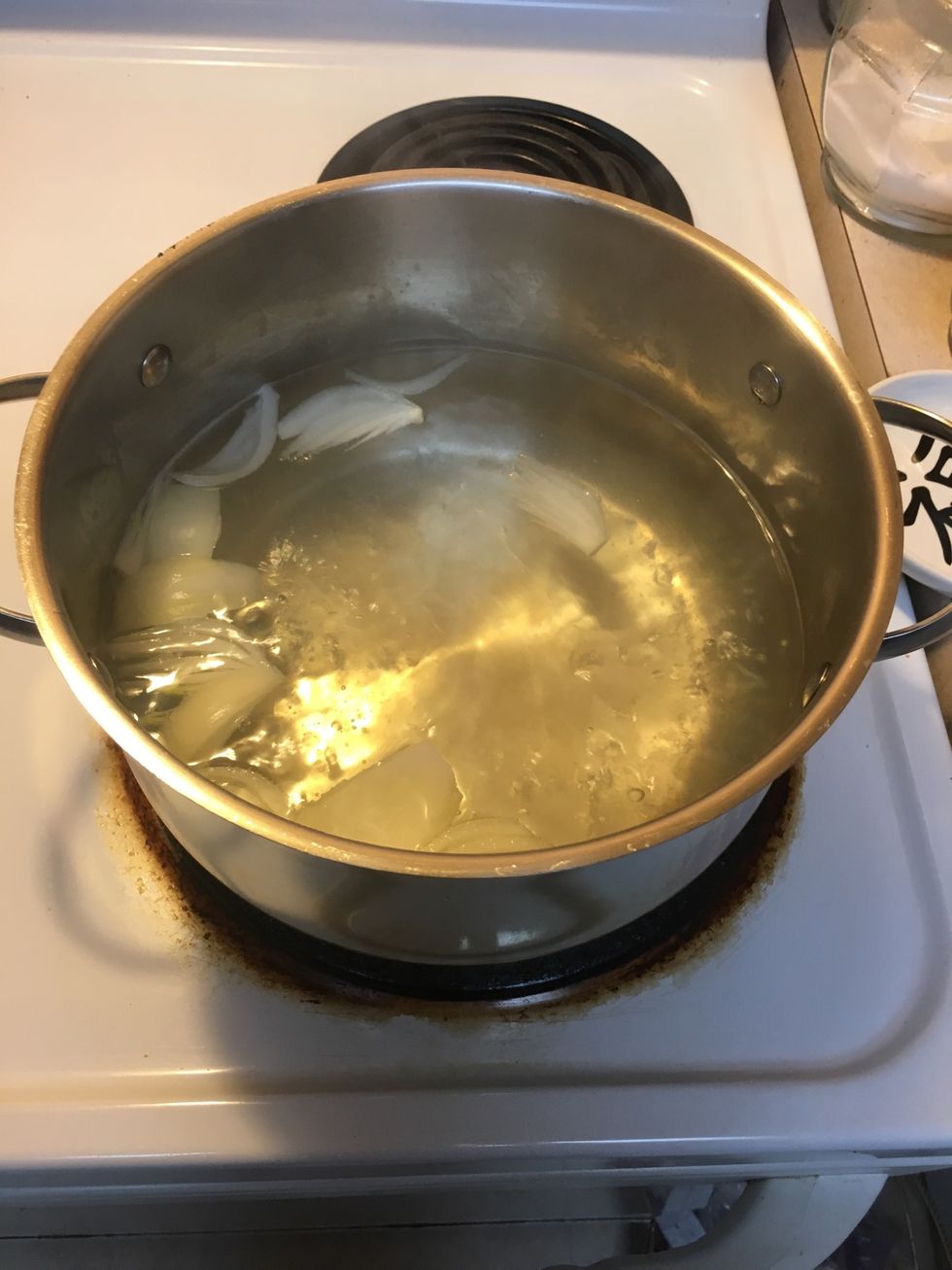 Add 1tbsp of salt, 2 tbsp of sugar, and half of a yellow onion