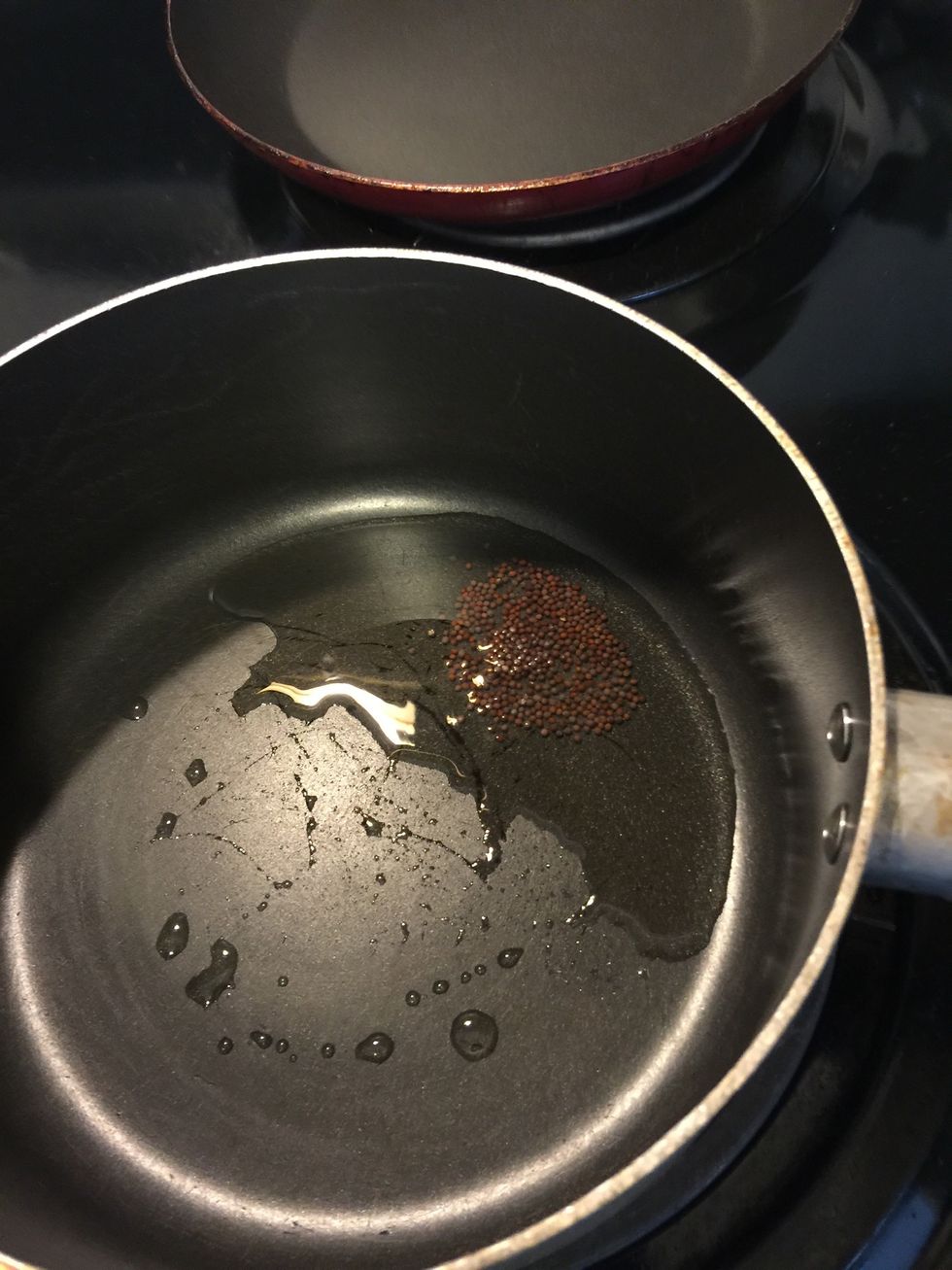 Add 1tsp mustard seeds, wait till they splutter.