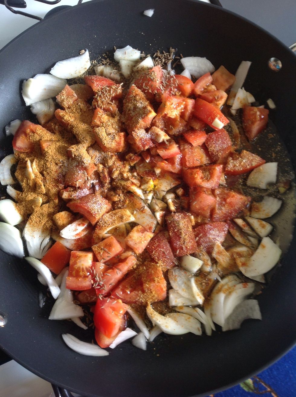 Add 1tsp of the cumin seed, 1 tsp of the coriander powder, 1 heaping spoon of curry powder, a pinch of turmeric, 1/2 tsp (or less) of cayenne pepper, and 1/2 tsp of salt