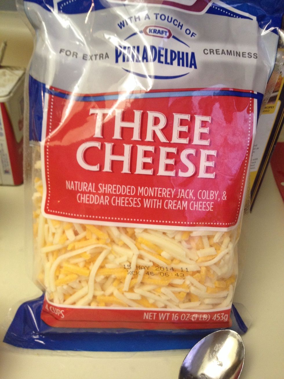 Add 2 1/2 cup mixture of cheddar and Monterey Jack cheese.