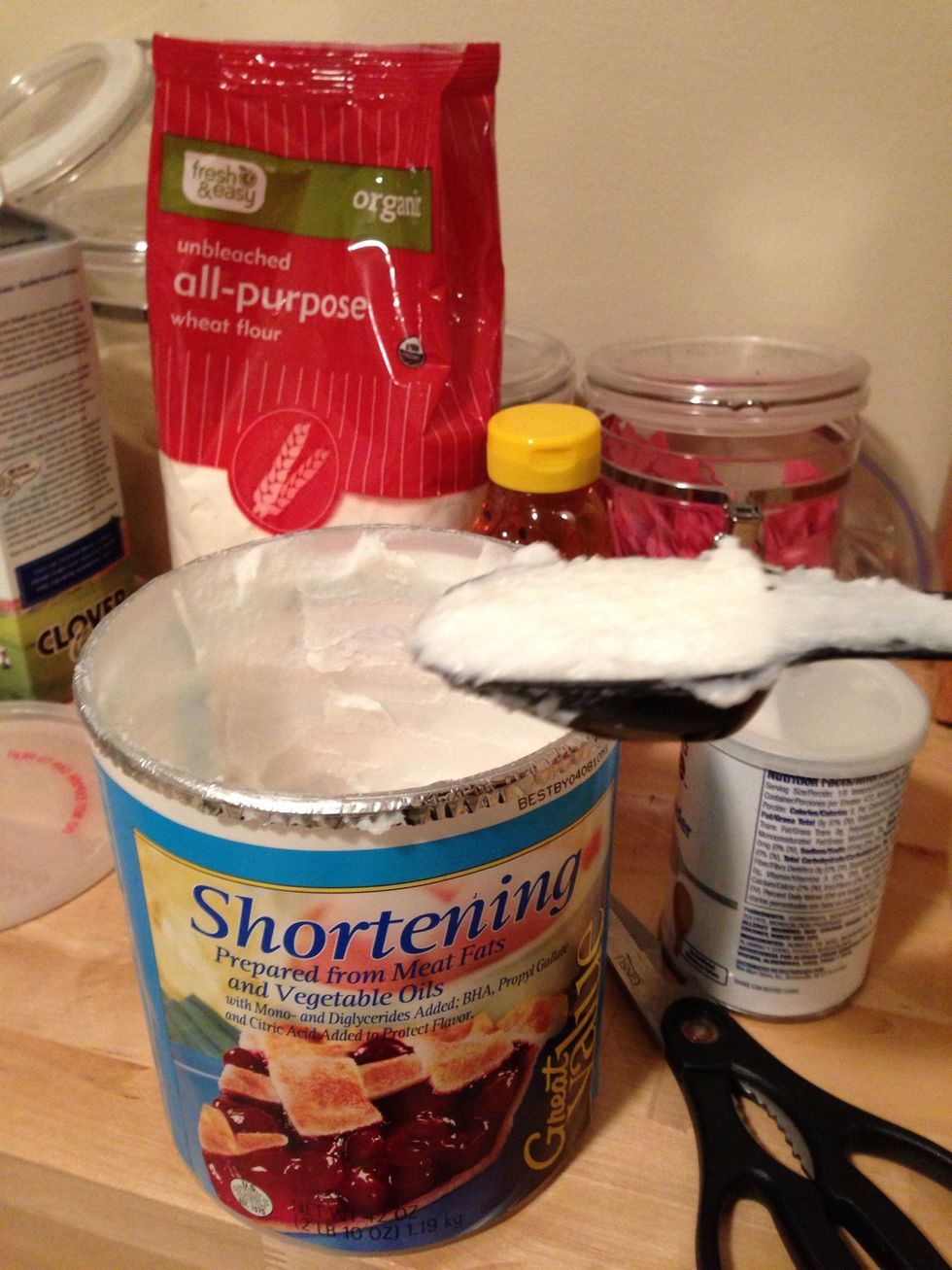 Add 2 1/2 tablespoon of shortening or lard to the mixture.