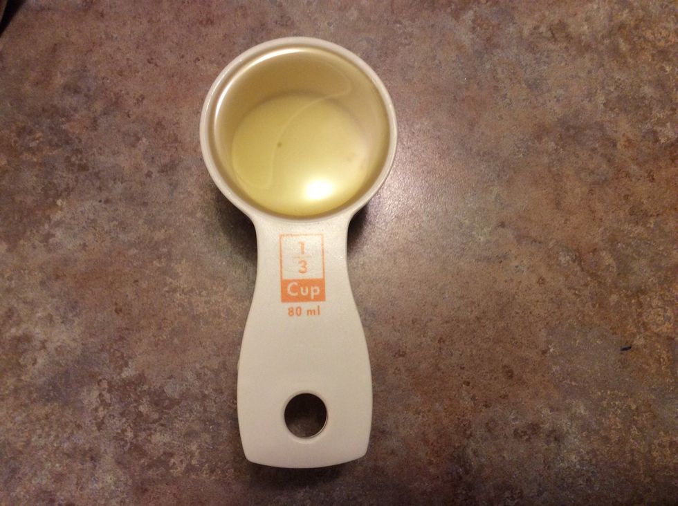 Add 2/3 cup oil into the bowl.