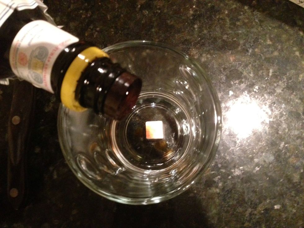 Add 2-3 drops of bitters. Don't worry, this will not make your drink bitter, but instead bind the flavor together.
