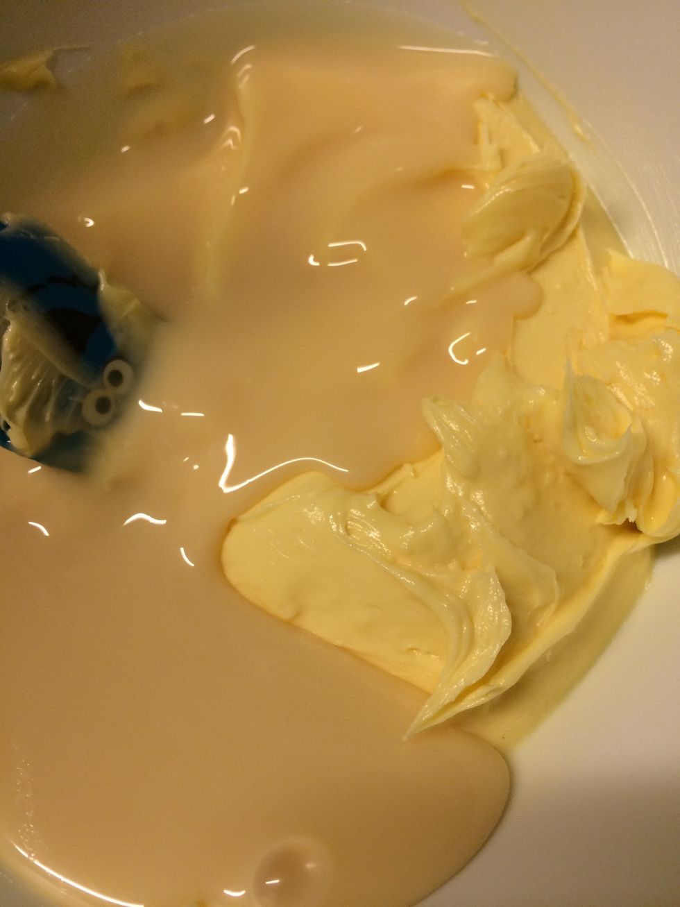 add 2/3 of condensed milk, beat well