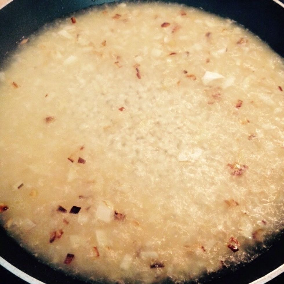 Add 2/3 of the vegetable stock