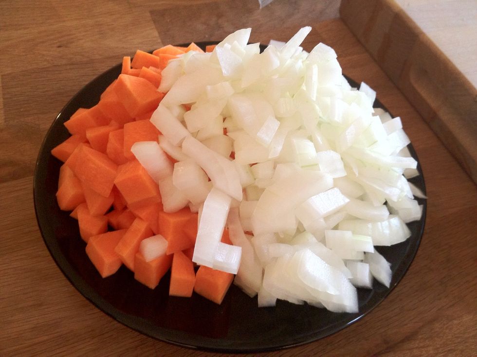 Add 2/3rds of chopped veg in the Dutch oven