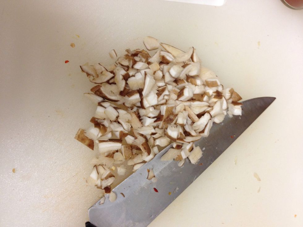 Add 2 chopped shiitake mushrooms