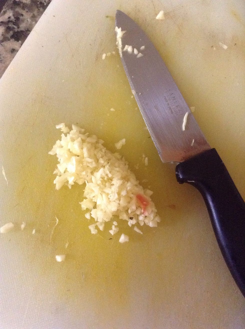 Add 2 cloves of crushed garlic in the sauce after adding meatballs to have strong flavor of garlic