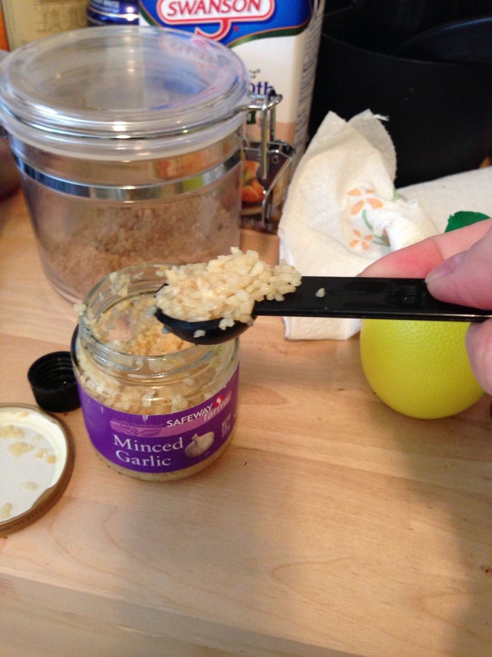 Add 2 cloves of minced garlic or 1 tsp of preminced garlic to the bowl.