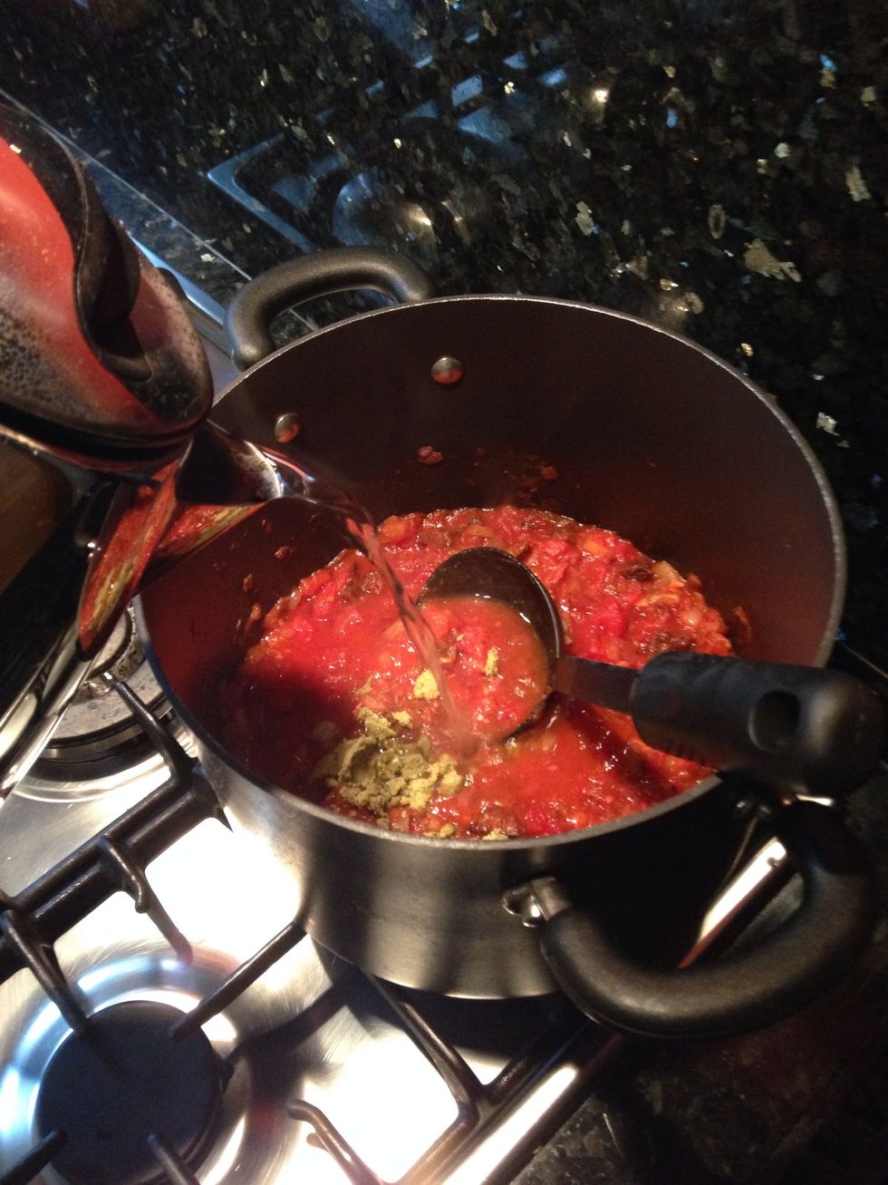 Add 2 cubes of Veg Stock with boiling water