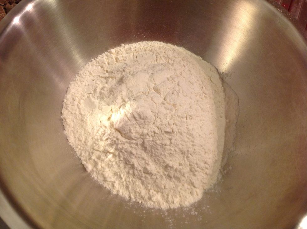 Add 2 cup of raising flour into the mixing bowl.