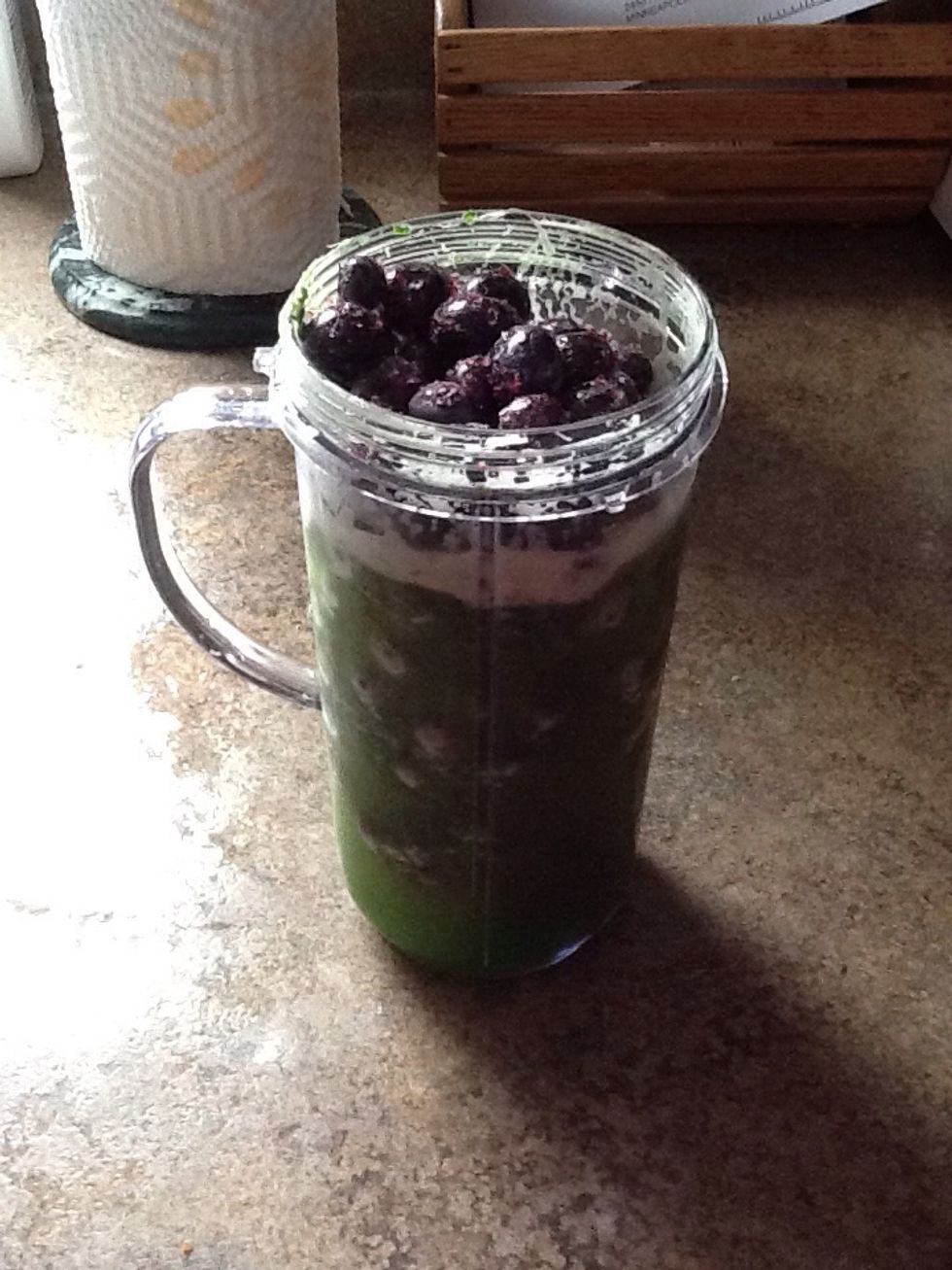 Add 2 cups of blueberries. Frozen blueberries help keep your smoothie cold plus you won't have to add any ice later!