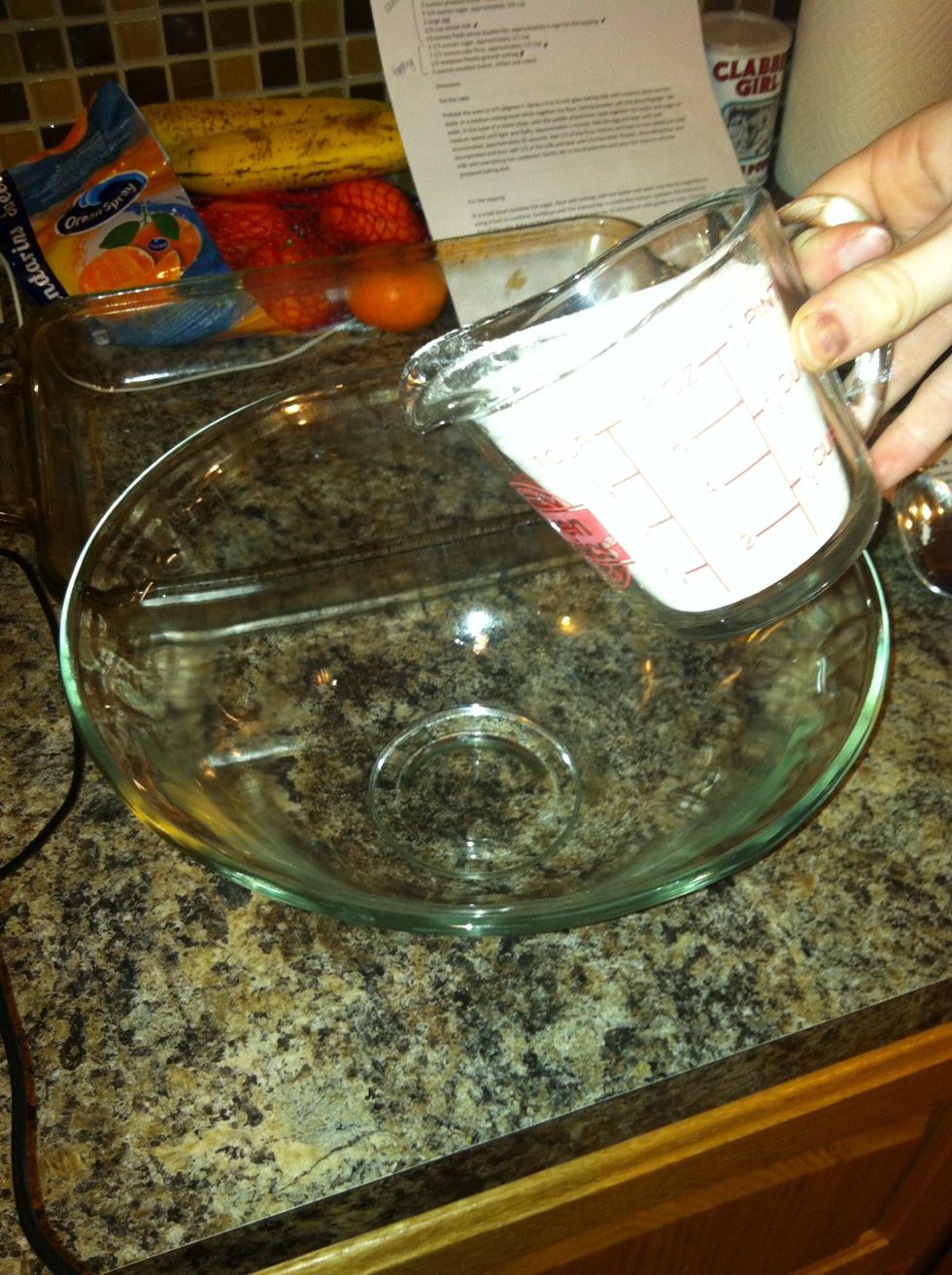 Add 2 cups of cake flour to a medium sized bowl which will be the dry ingredients.