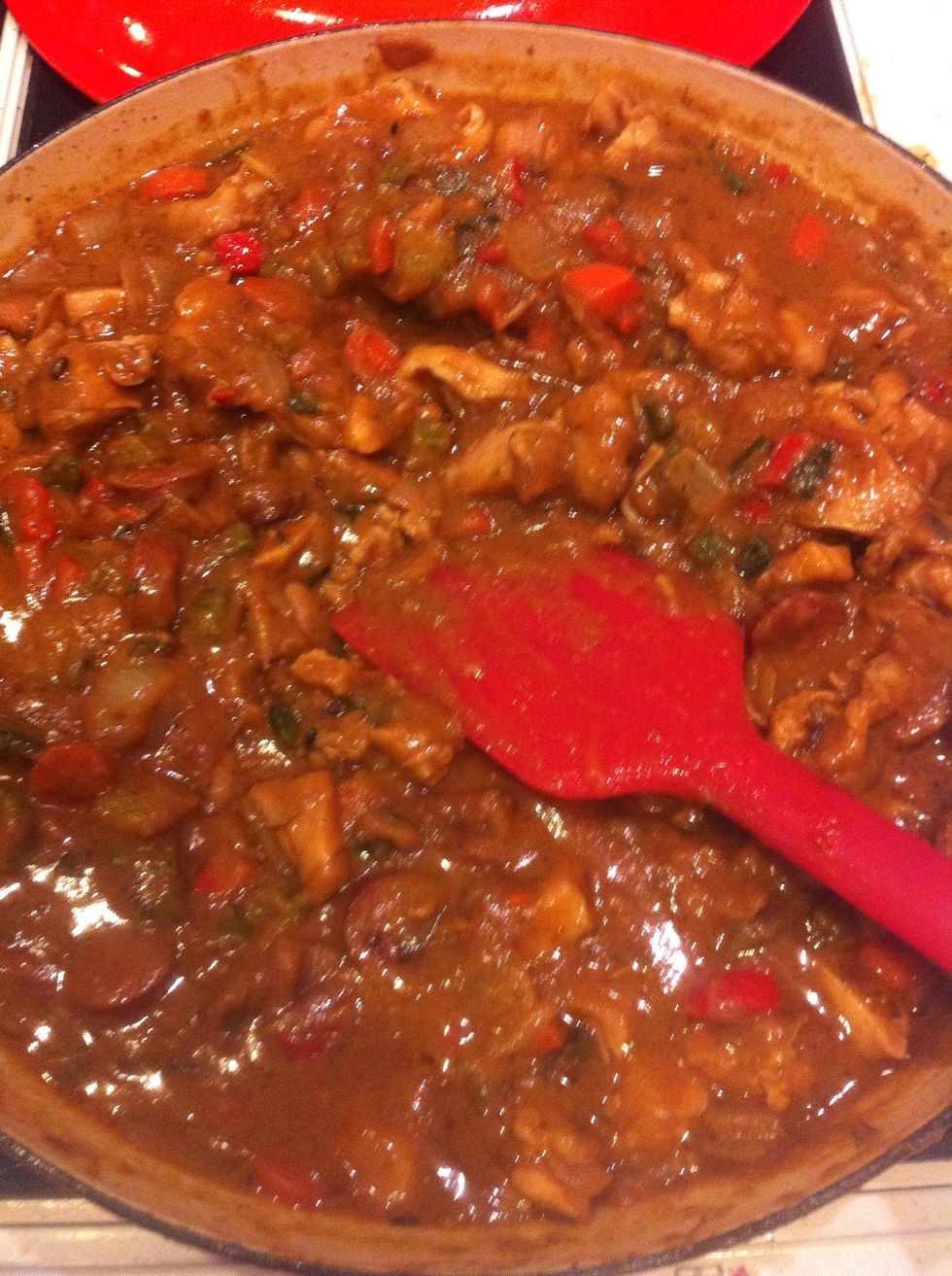 Add 2 cups of chicken stock. Mix well