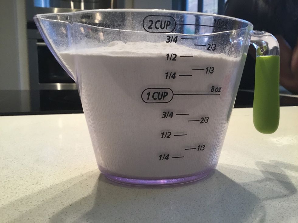 Add 2 cups of flour to a mixing bowl