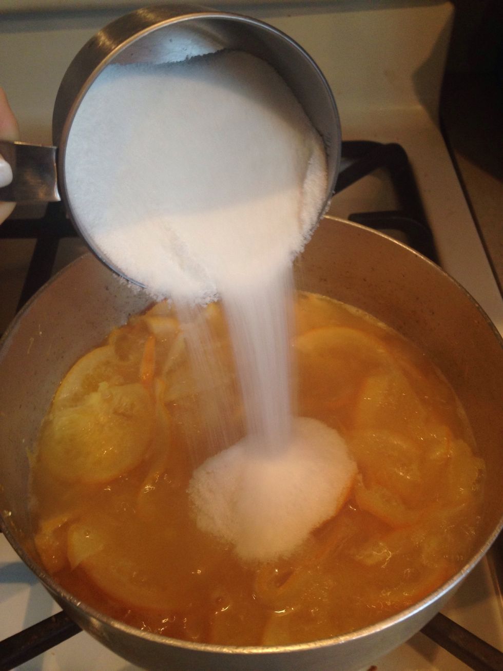 Add 2 cups of sugar and the minced apple