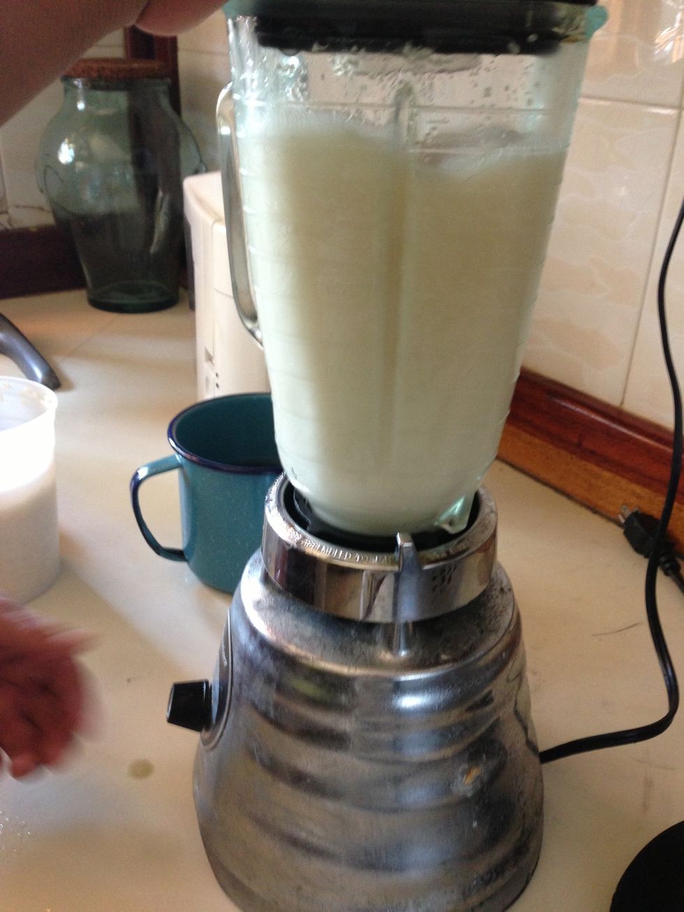 add 2 cups of water, cinamon and blend. You will not blend all rise just a portion