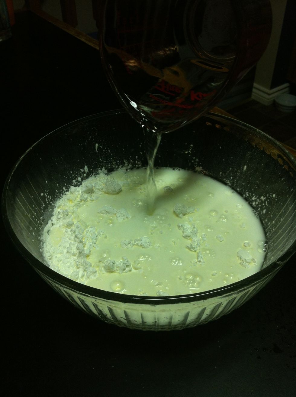 Add 2 cups of water on top of the corn starch.