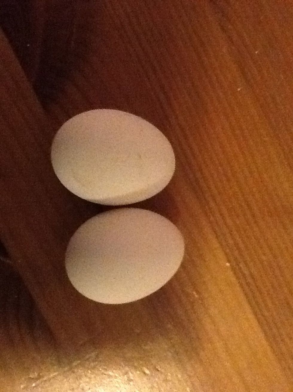 Add 2 eggs to the batter.