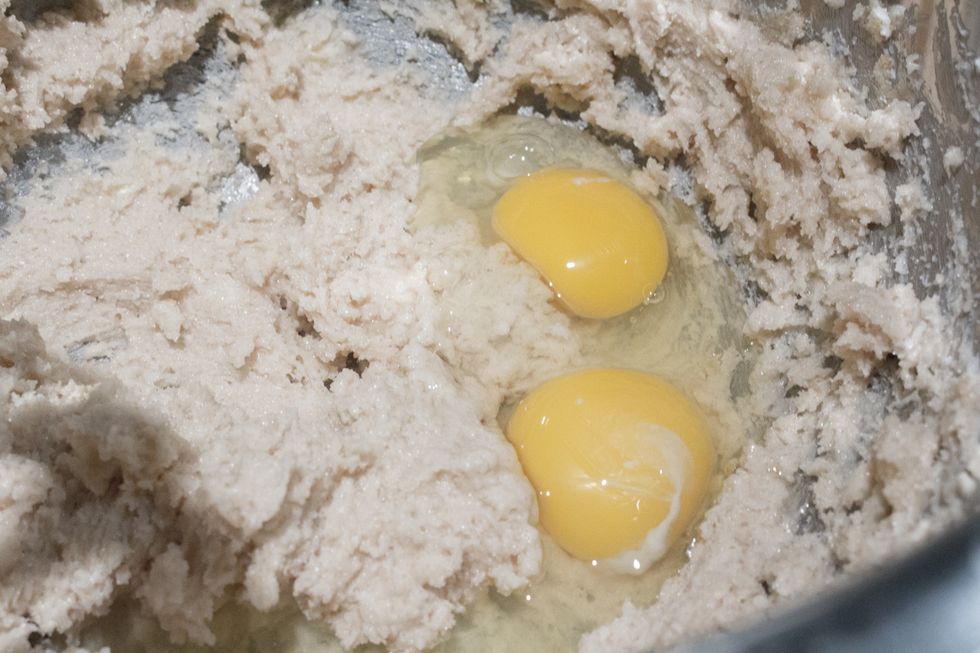 Add 2 eggs to the butter mixture.