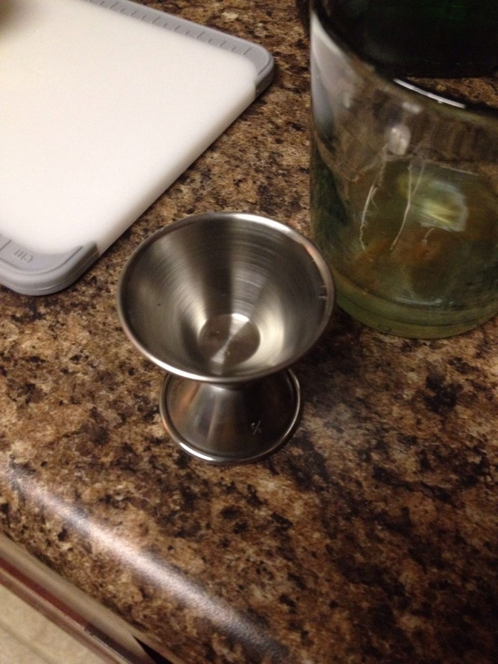 Add 2 fluid ounces / 60 ml gin.