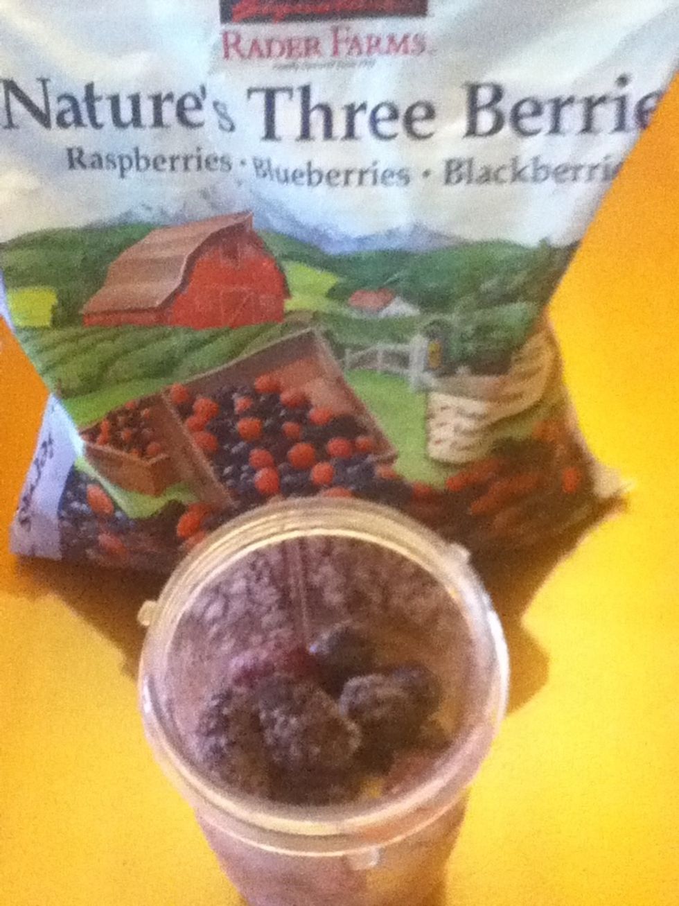 Add 2 handfuls of frozen berries (you can use any frozen fruit that you chose. Mine has black berries, blueberries, and raspberries)