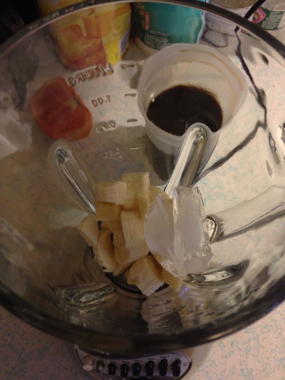 Add 2 ice cubes & your 1 small pieces banana in the blender