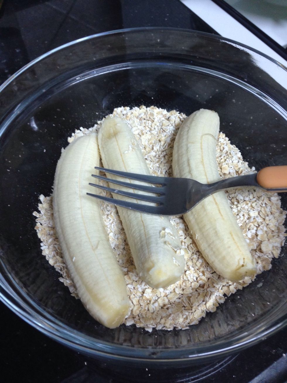 Add 2 large bananas ( i used 3 small) and start mashing