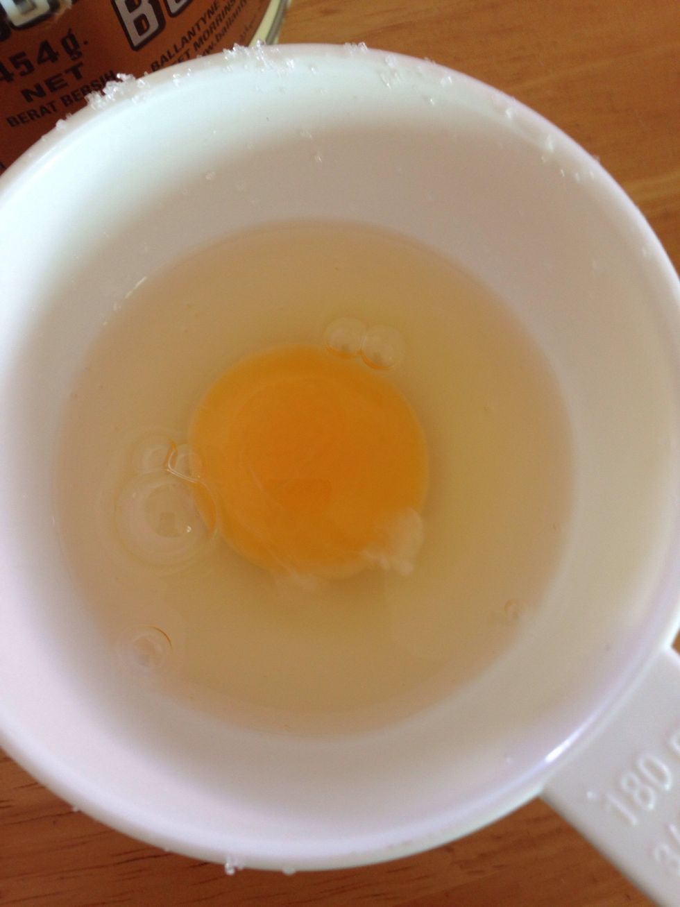 Add 2 large eggs or 3 small ones and beat. Do it one by one
