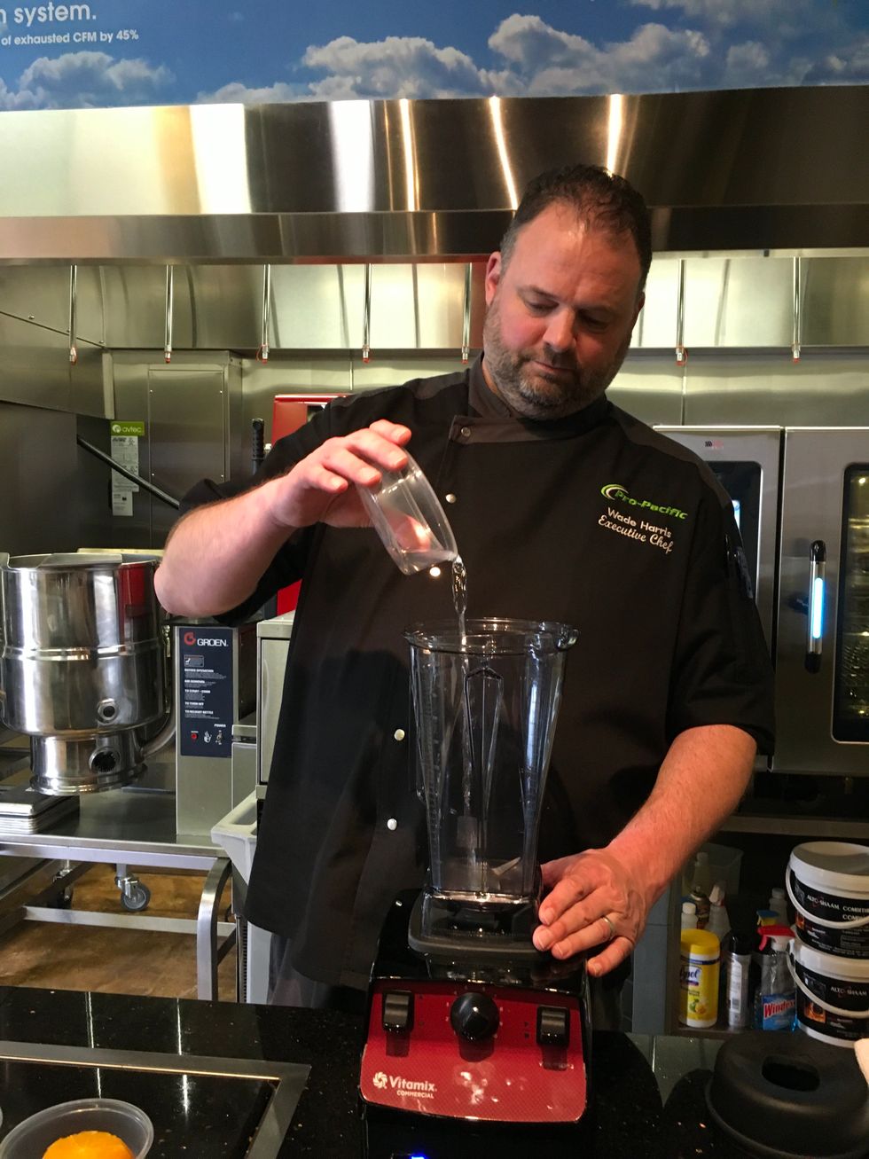 Add 2 ounces of water to Vitamix container.