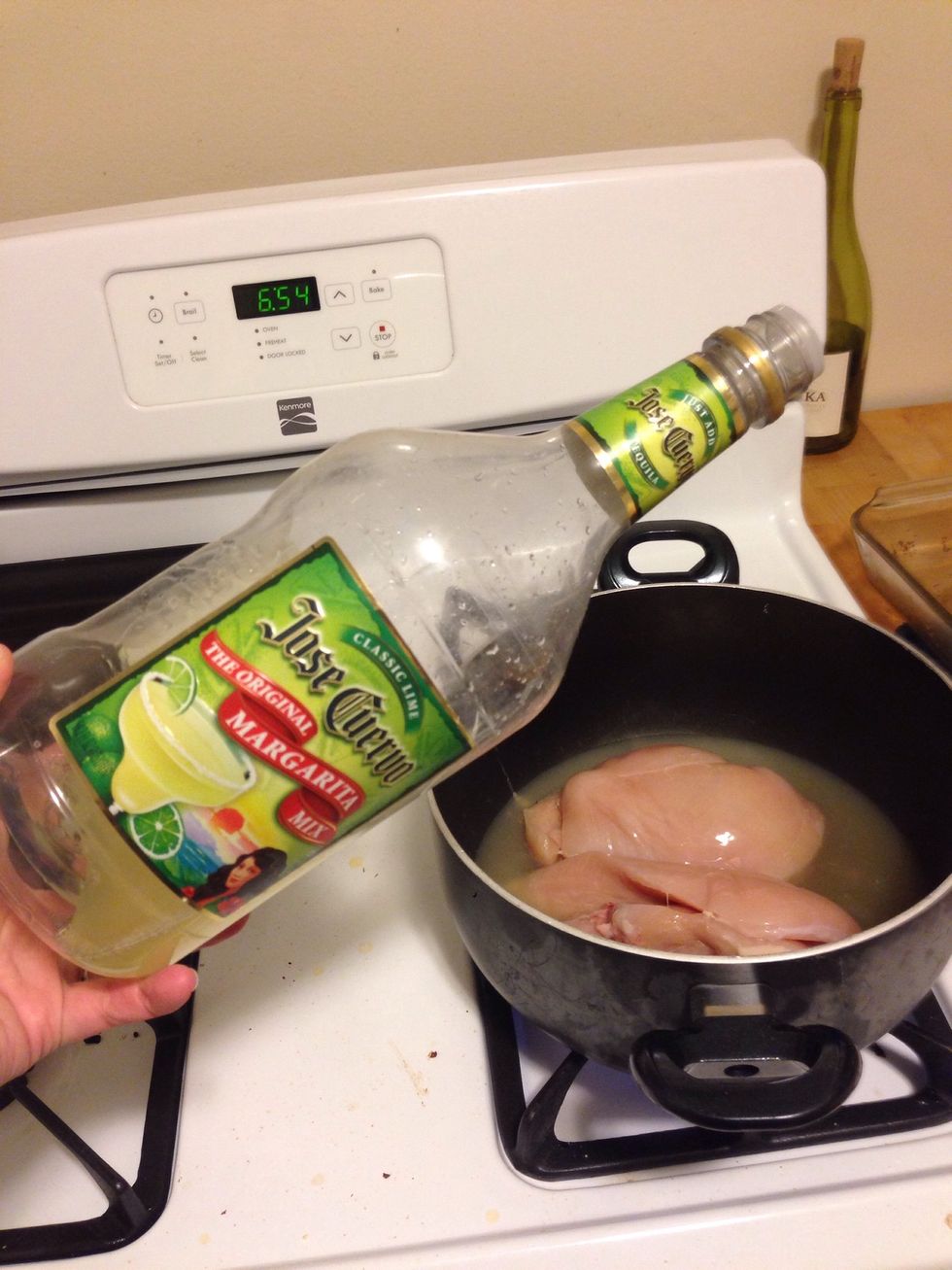 Add 2 oz of margarita mix to the mixture.