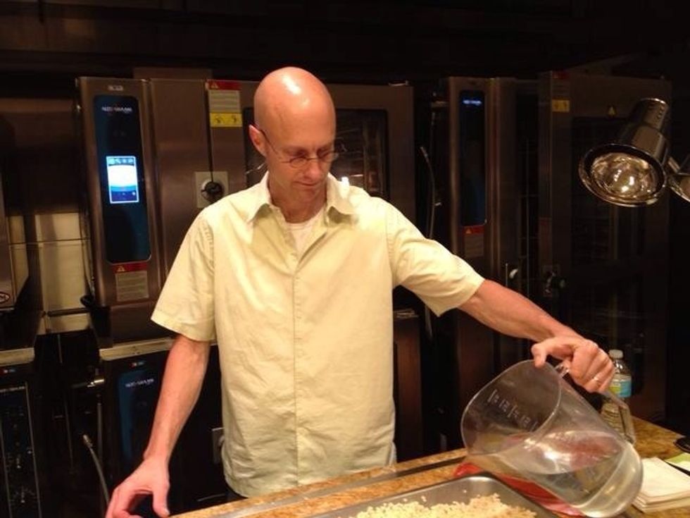 Add 2 qt. water to each pan