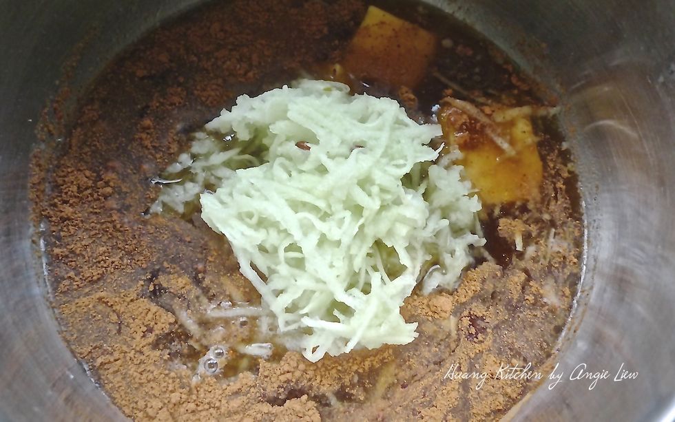 Add 2 shredded apples.