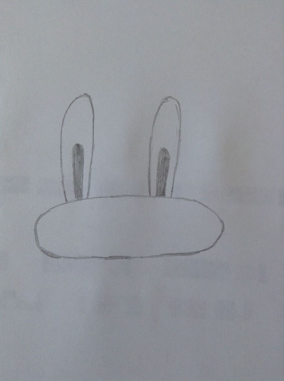 Add 2 smaller ovals as the bunnys pupils.
