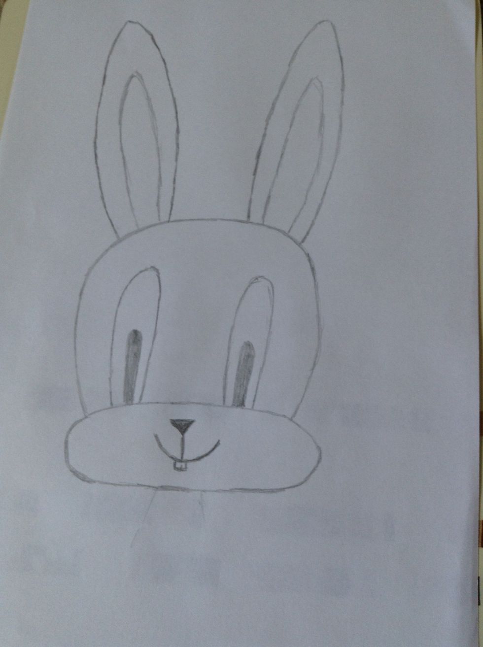 Add 2 smaller ovals in the ears to give the ears more shape.