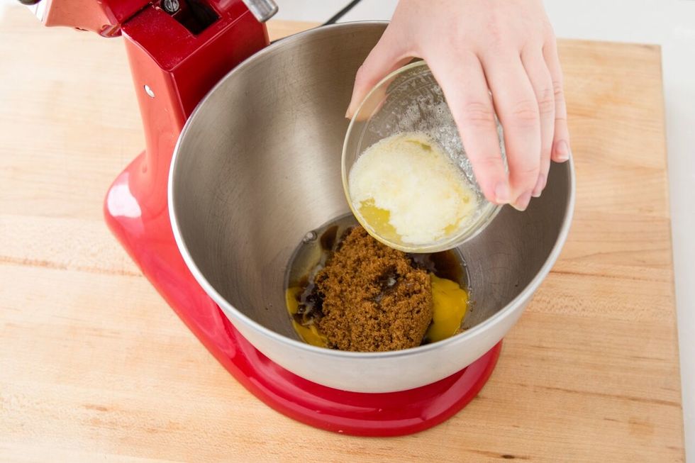 Add 2 tablespoons of butter, melted.