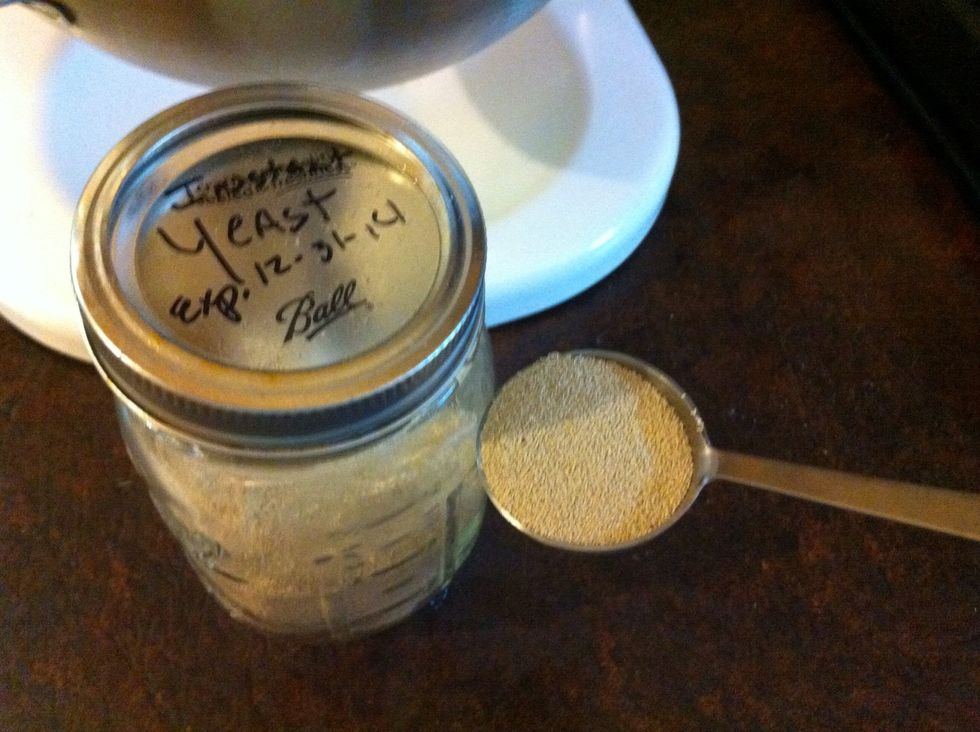 Add 2 Tablespoons of dry yeast. I buy in bulk, and keep in a mason jar in the freezer. But you can just use those yeast packets. Two packets is the same as 2 T of yeast.
