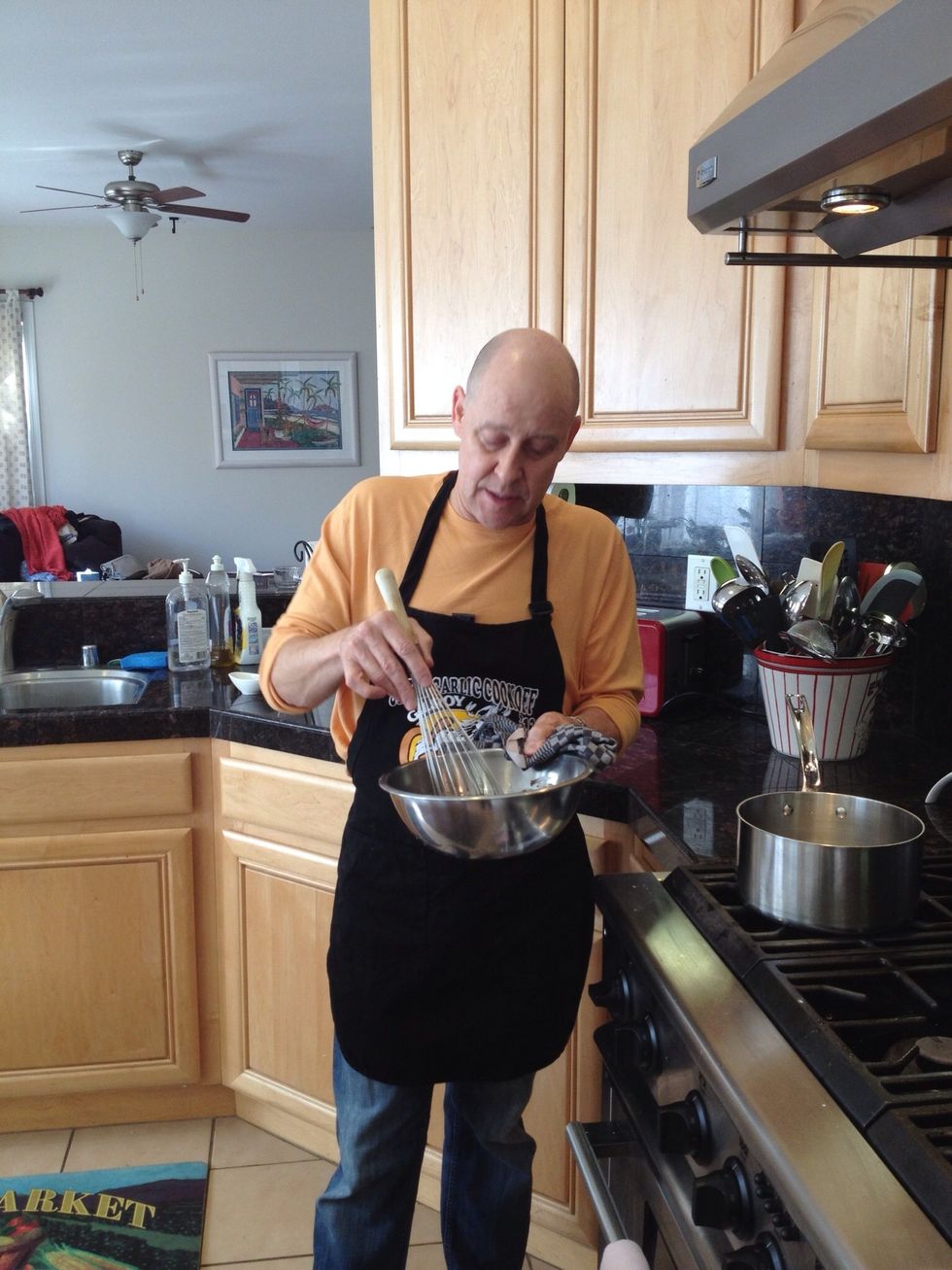 Add 2 tablespoons of heavy cream and one teaspoon of vanilla extract. Then mix all the ingredients together with a whisk.