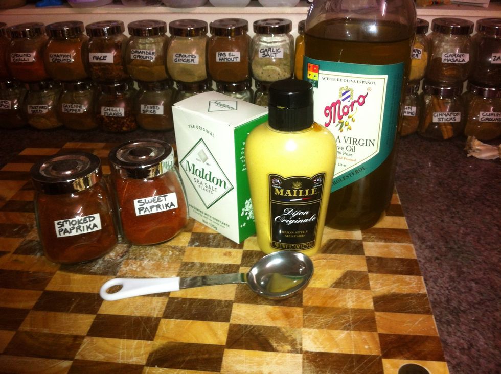 Add 2 tablespoons of olive oil, Dijon mustard, salt and paprika. I went half and half smoked and sweet paprika but use whatever kind you want