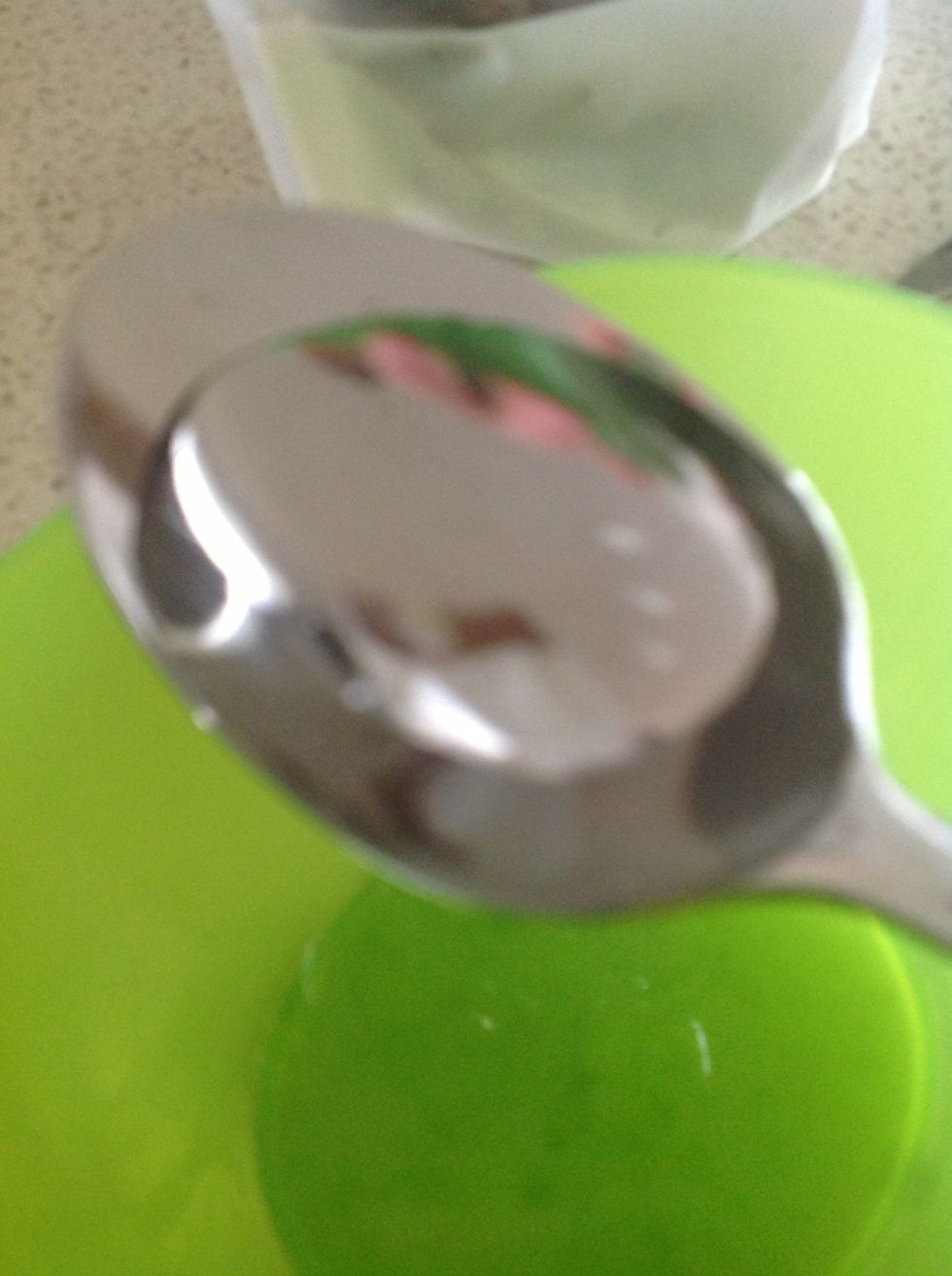 Add 2 tablespoons of the hot water