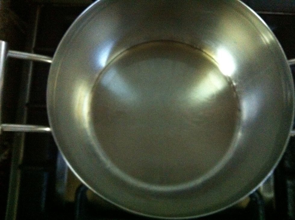 Add 2 tablespoons of veg oil to a pot, allow it to heat up on a medium flame