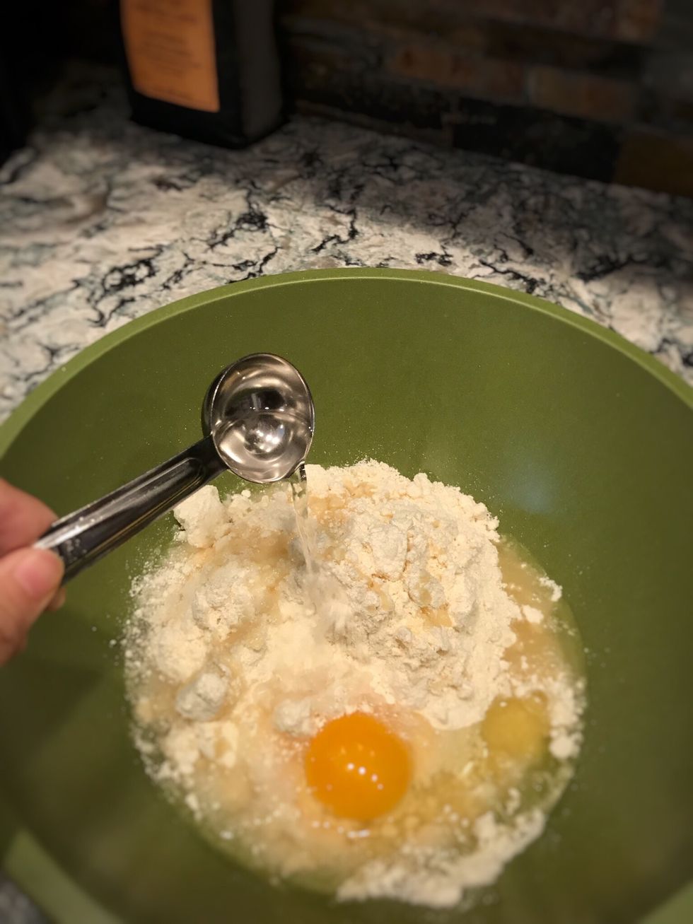 Add 2 Tbsp of water and mix till dough has formed and set aside