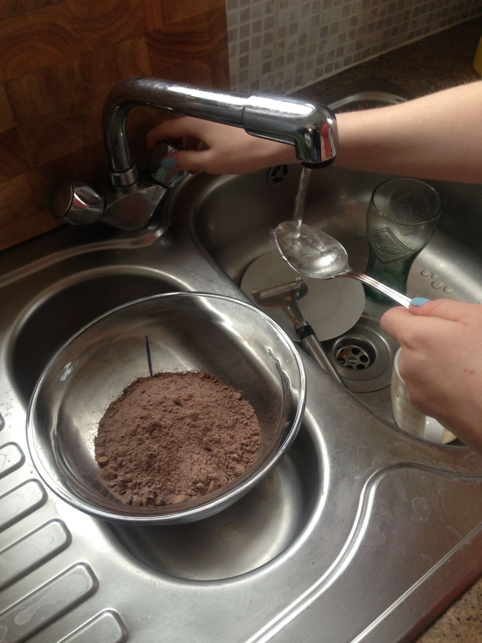 Add 2 to 3 table spoons of water into mixture