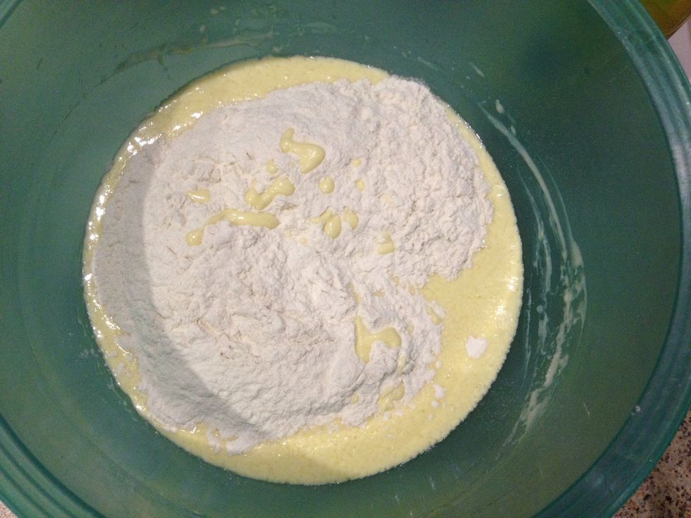 Add 200 grams of flour at a time - then mix - then 200 grams more and etc.