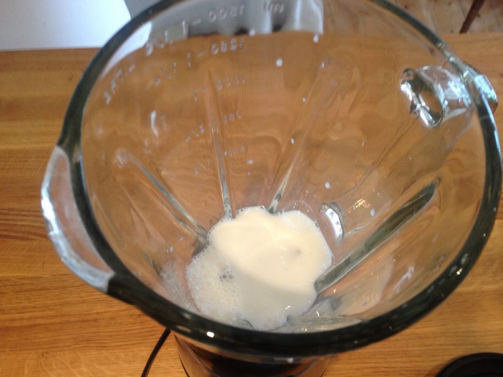 Add 250ml almond milk to a blender