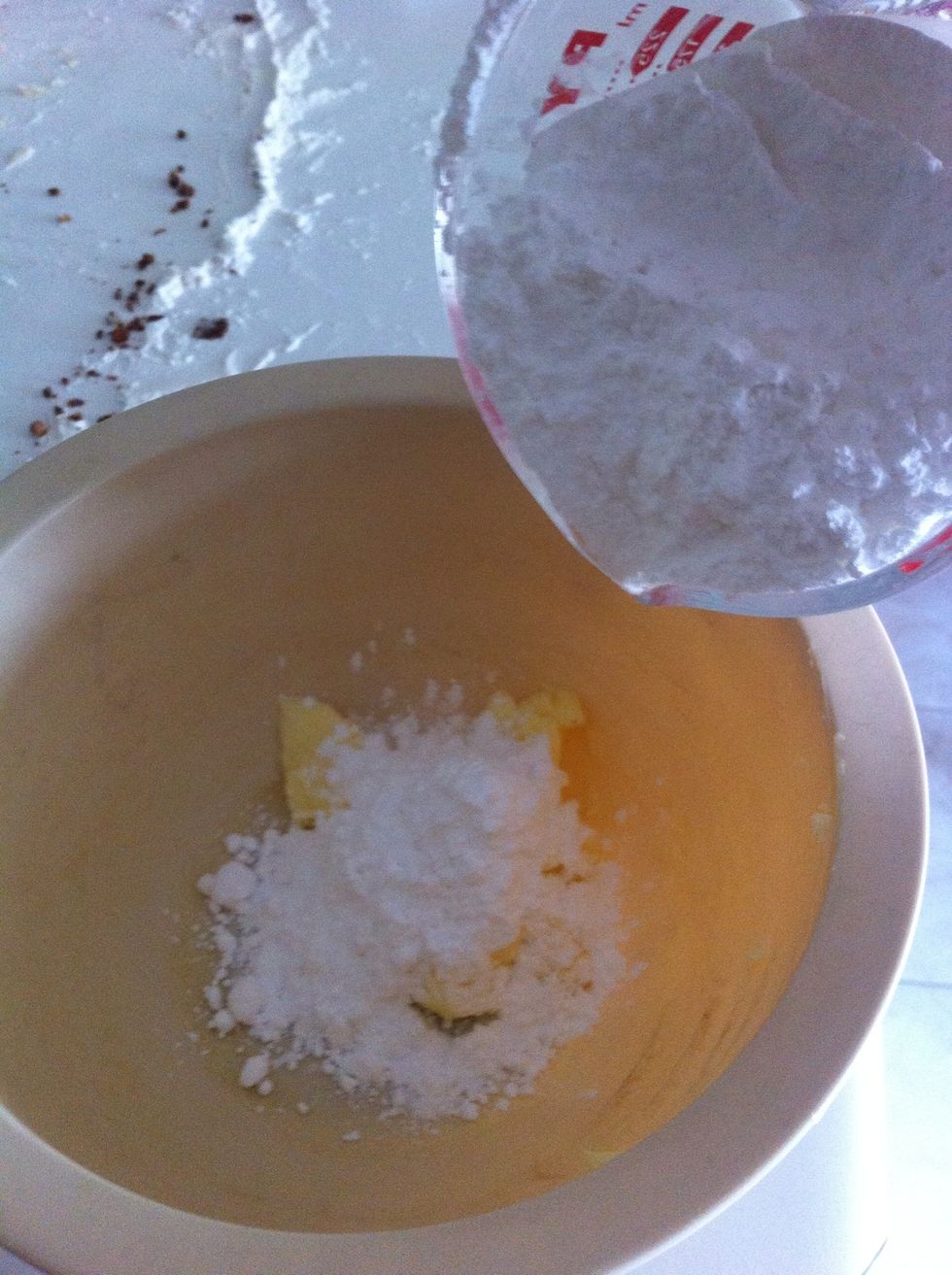 Add 250mL of icing sugar! (Also known as 1 cup)