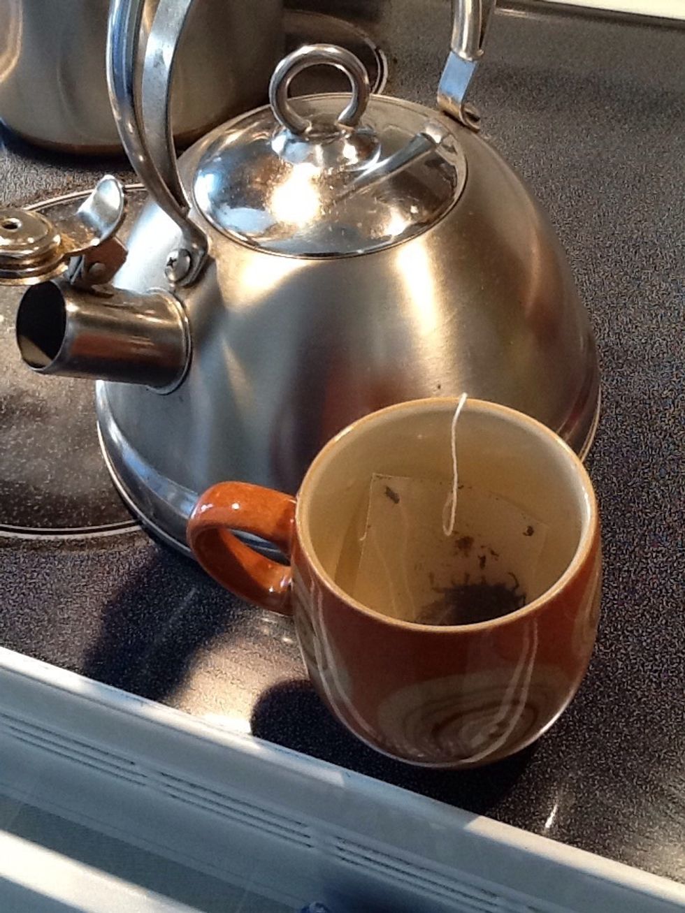 Add 2cups of boiling water to your favorite green tea. Let it steep then cool it in the fridge for 1hr. You can chose not to cool the tea to save time--popcycles will take on the fruits' color.