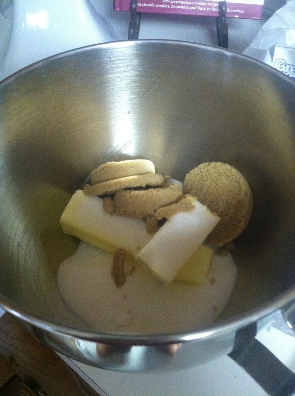 Add 3/4 cup softened butter (1 1/2 sticks), 3/4 cup white sugar, 3/4 cup packed light brown sugar to a large bowl and cream together.