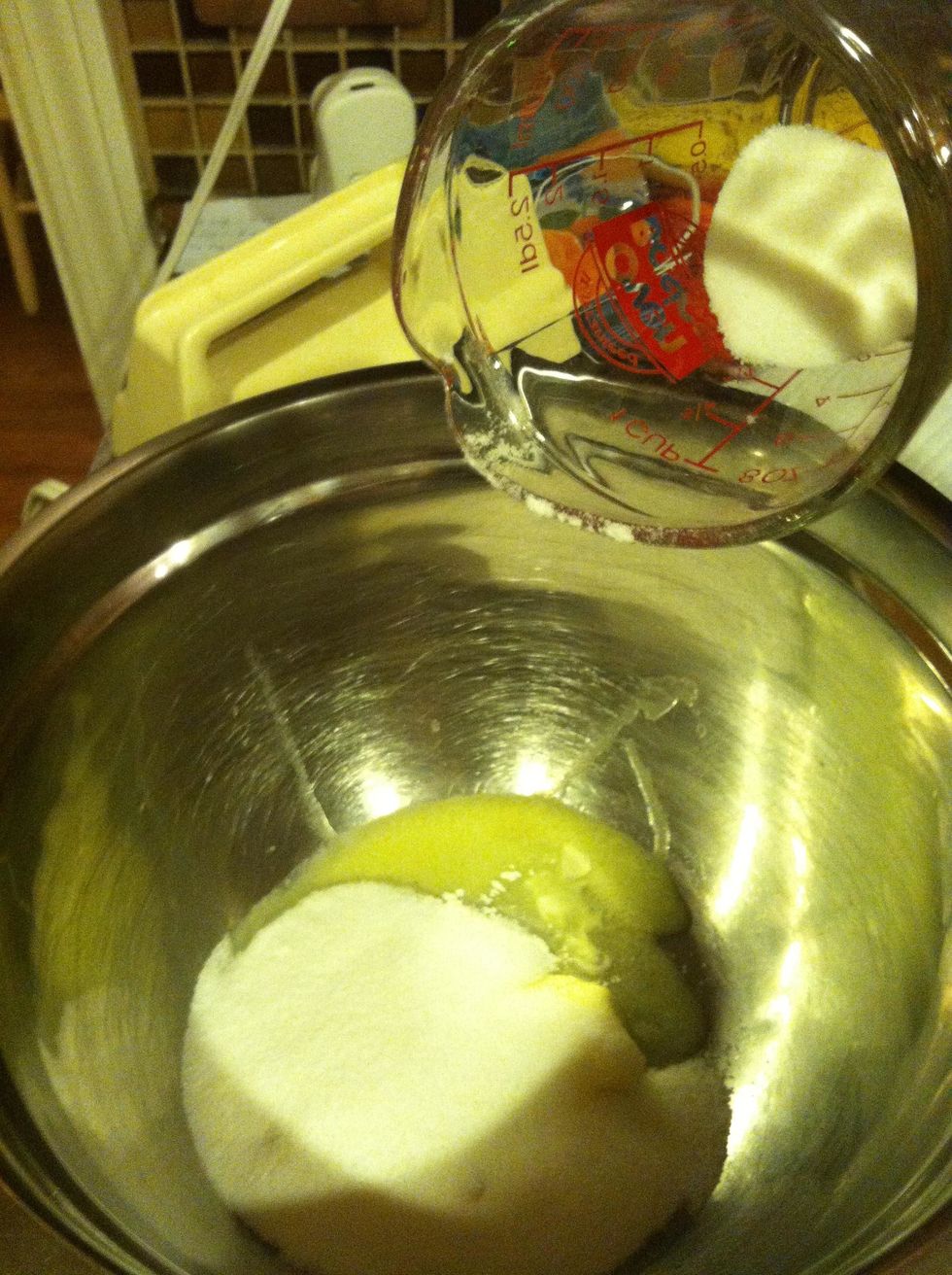 Add 3/4 cup sugar to the room temperature butter.